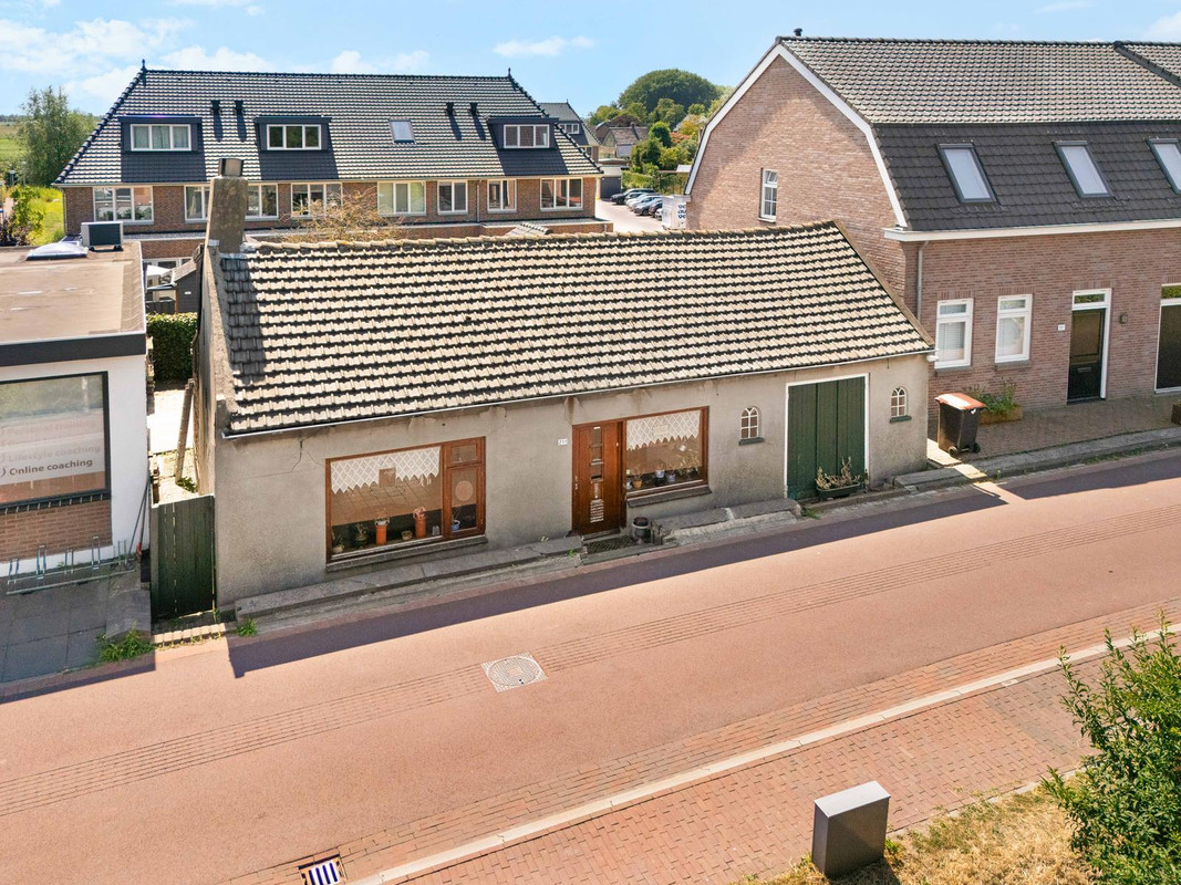 Vrijstaande woning te koop: Dorpsdijk 211, Rhoon