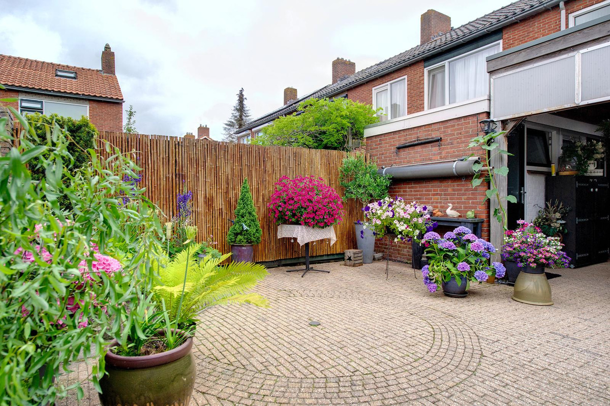 Tussenwoning te koop: Gladiolenstraat 48, Sappemeer