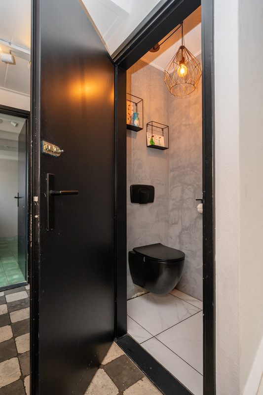 Tussenwoning te koop: Schoorwal 3, Den Burg