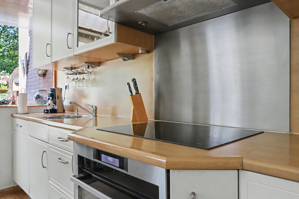 Tussenwoning te koop: Korhoenlaan 28, Zeist