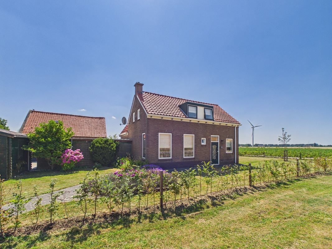 Vrijstaande woning te koop: Westlangeweg 14, Hoofdplaat
