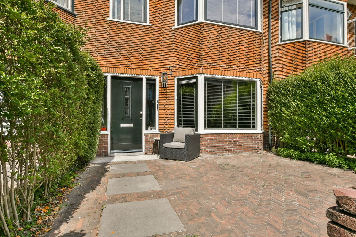 Tussenwoning te koop: Tiboel Siegenbeekstraat 11, Leiden