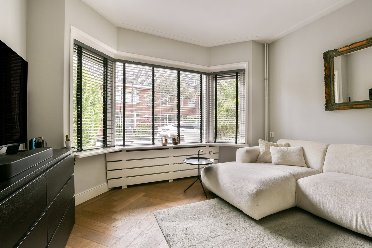 Tussenwoning te koop: Tiboel Siegenbeekstraat 11, Leiden