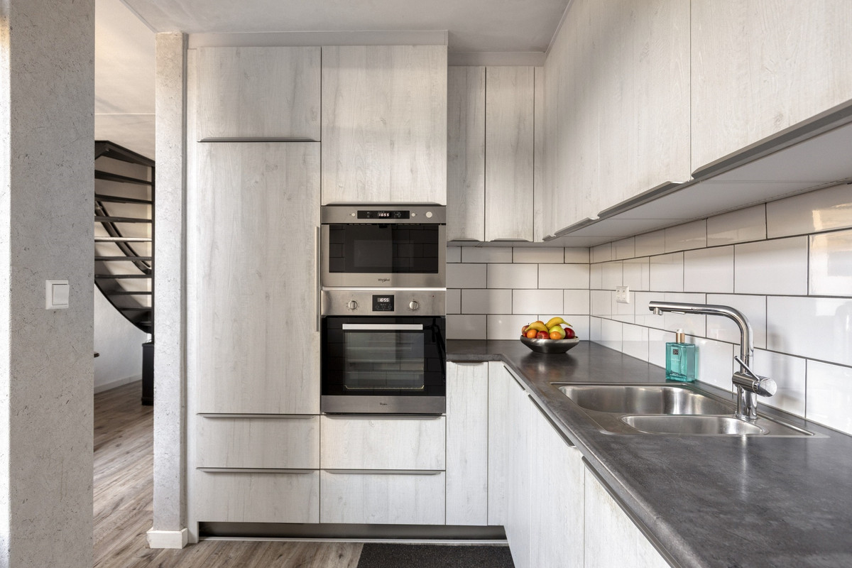Tussenwoning te koop: Vredeman de Vriesstraat 50B, Tilburg