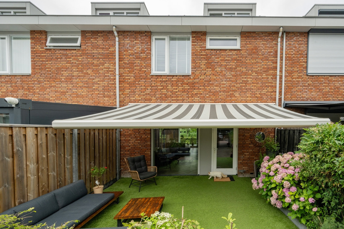 Tussenwoning te koop: Raadsliedenstraat 13, Leerdam