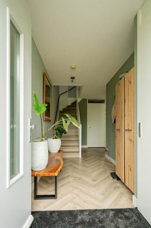 Tussenwoning te koop: Raadsliedenstraat 13, Leerdam