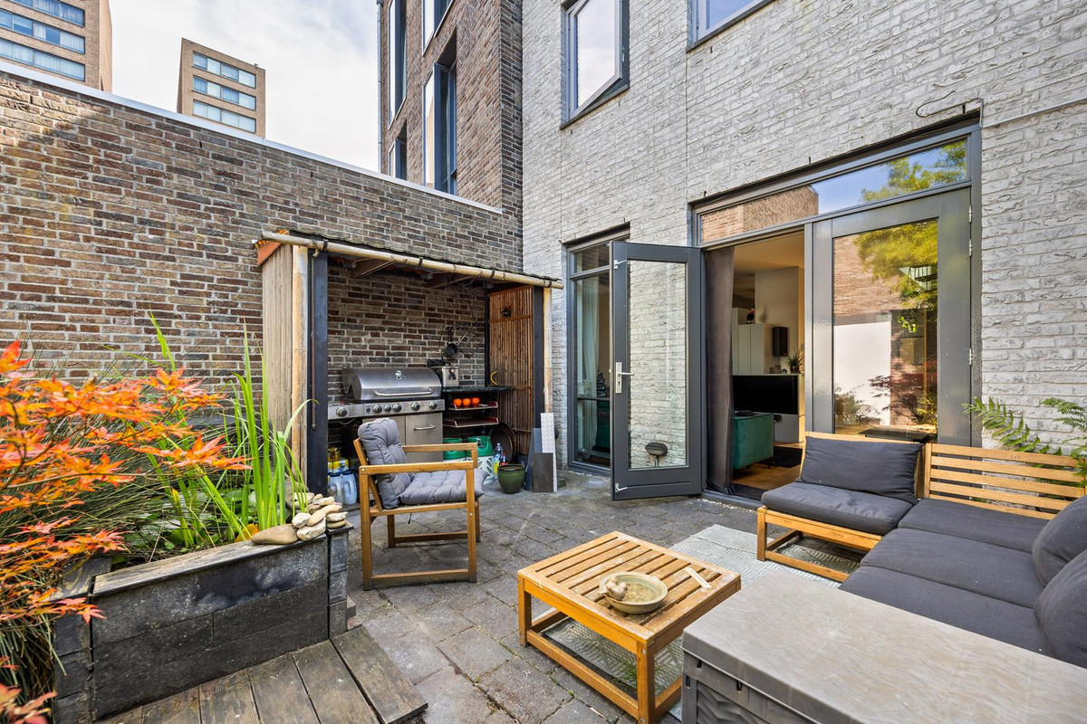 Tussenwoning te koop: Scholekstersingel 68, 'S-Gravenhage
