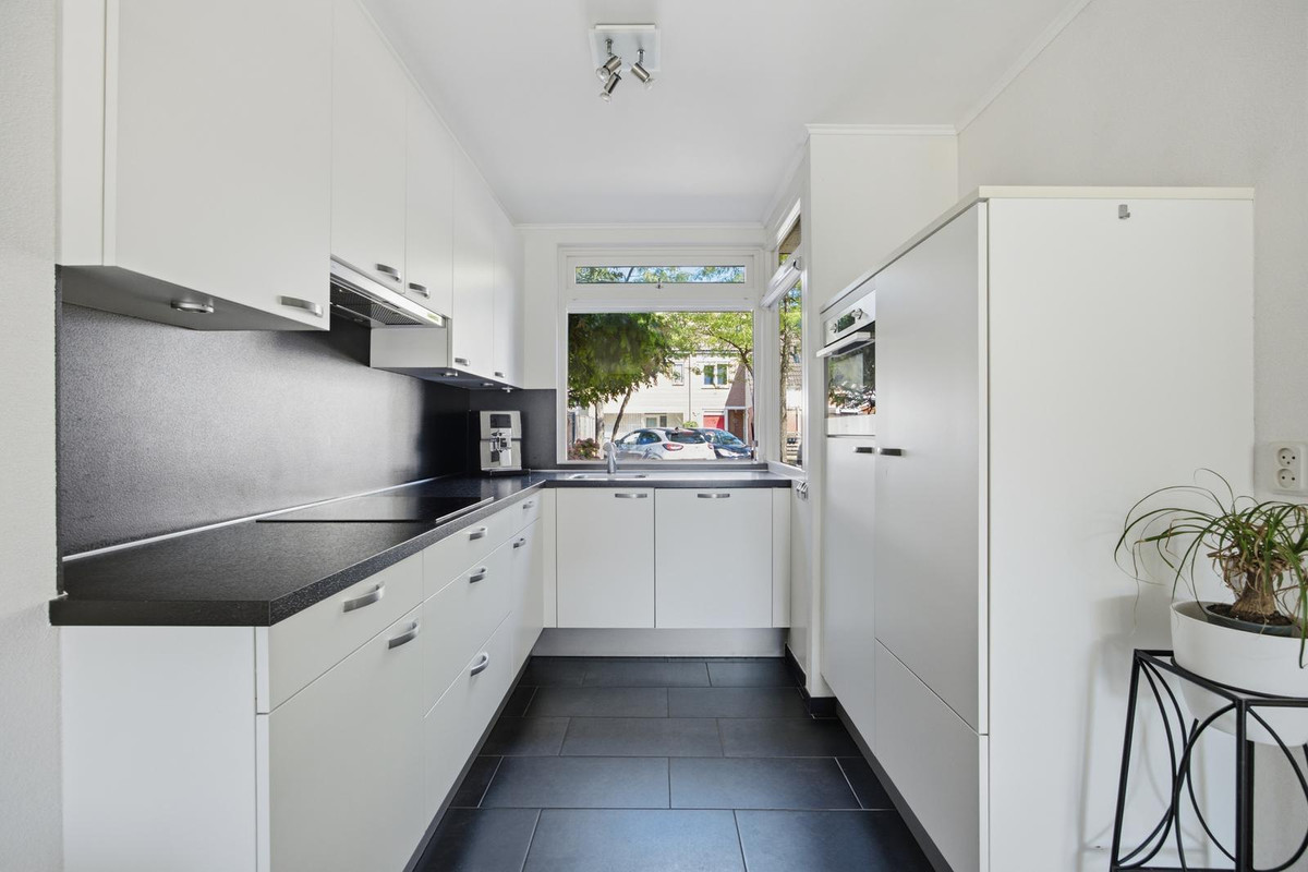 Tussenwoning te koop: Huiserf 23, Breda