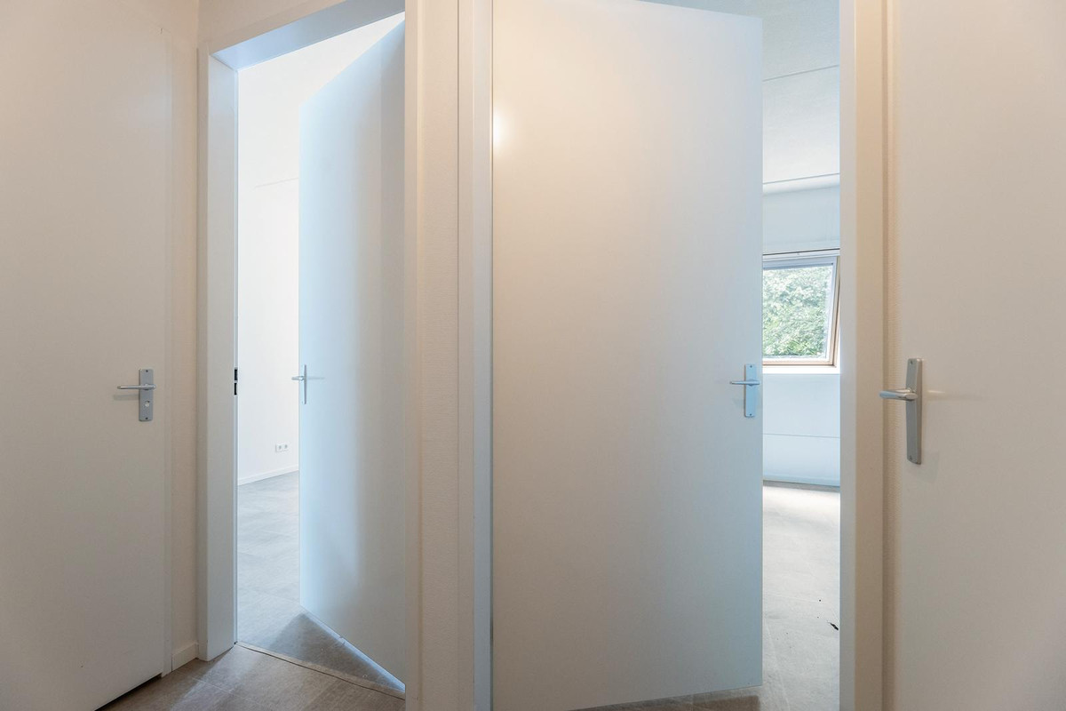 Tussenwoning te koop: Dennenweg 183A, Enschede