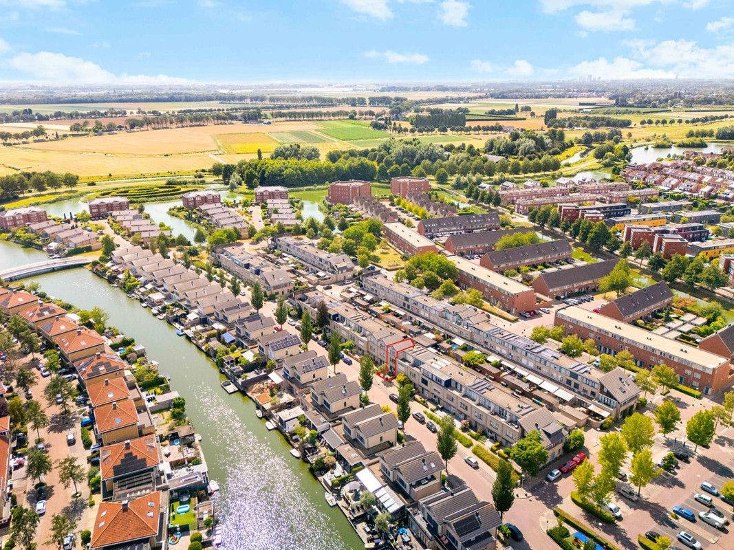 Tussenwoning te koop: Topaaslaan 22, Rhoon