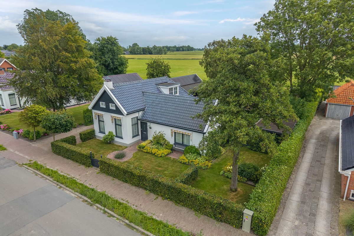 Vrijstaande woning te koop: Wirdumerweg 63, Wirdum
