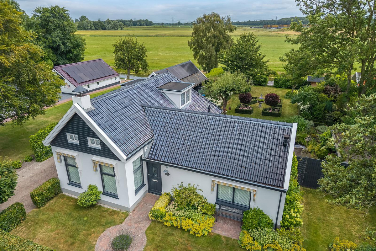 Vrijstaande woning te koop: Wirdumerweg 63, Wirdum