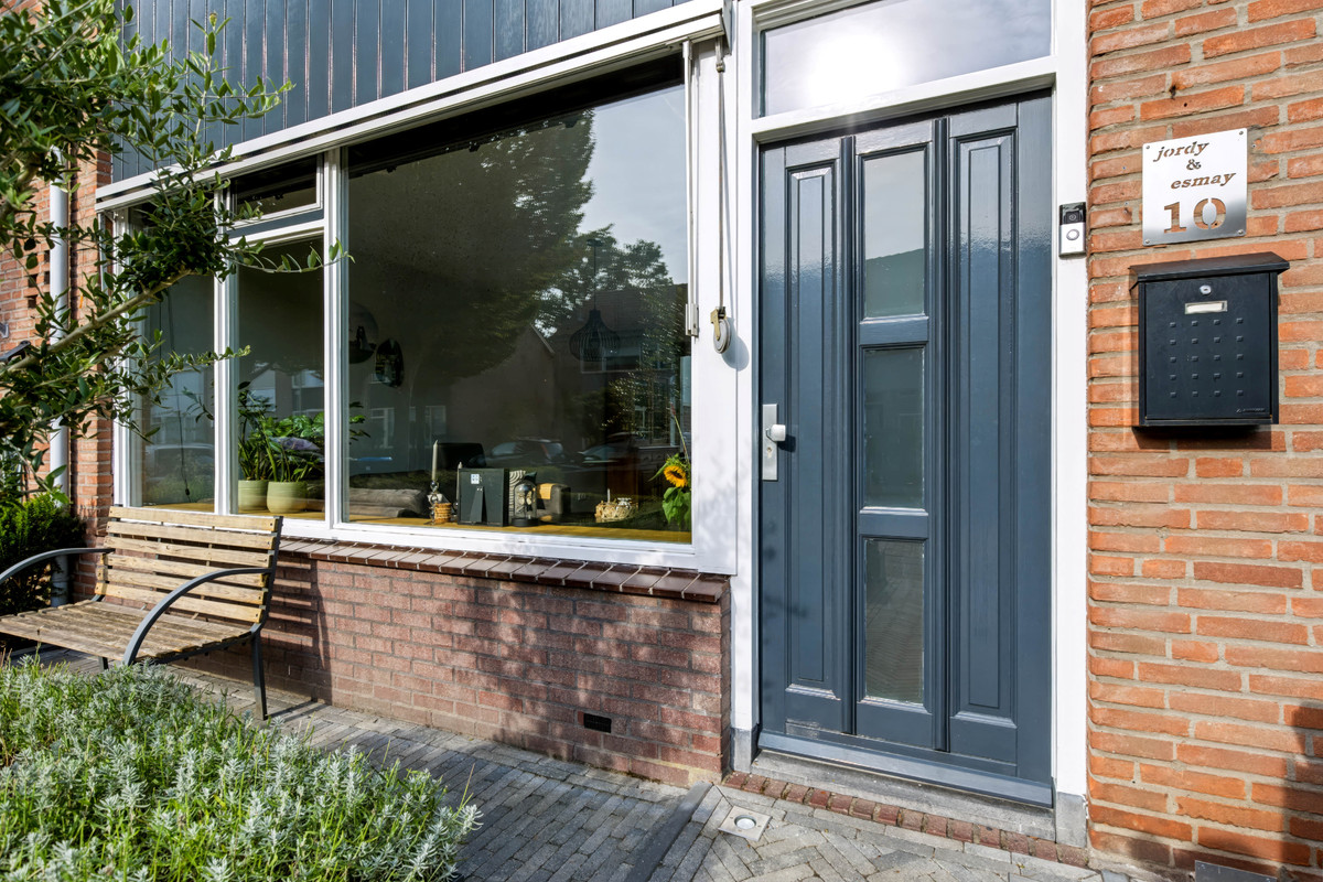 Tussenwoning te koop: Merelstraat 10, Vaassen
