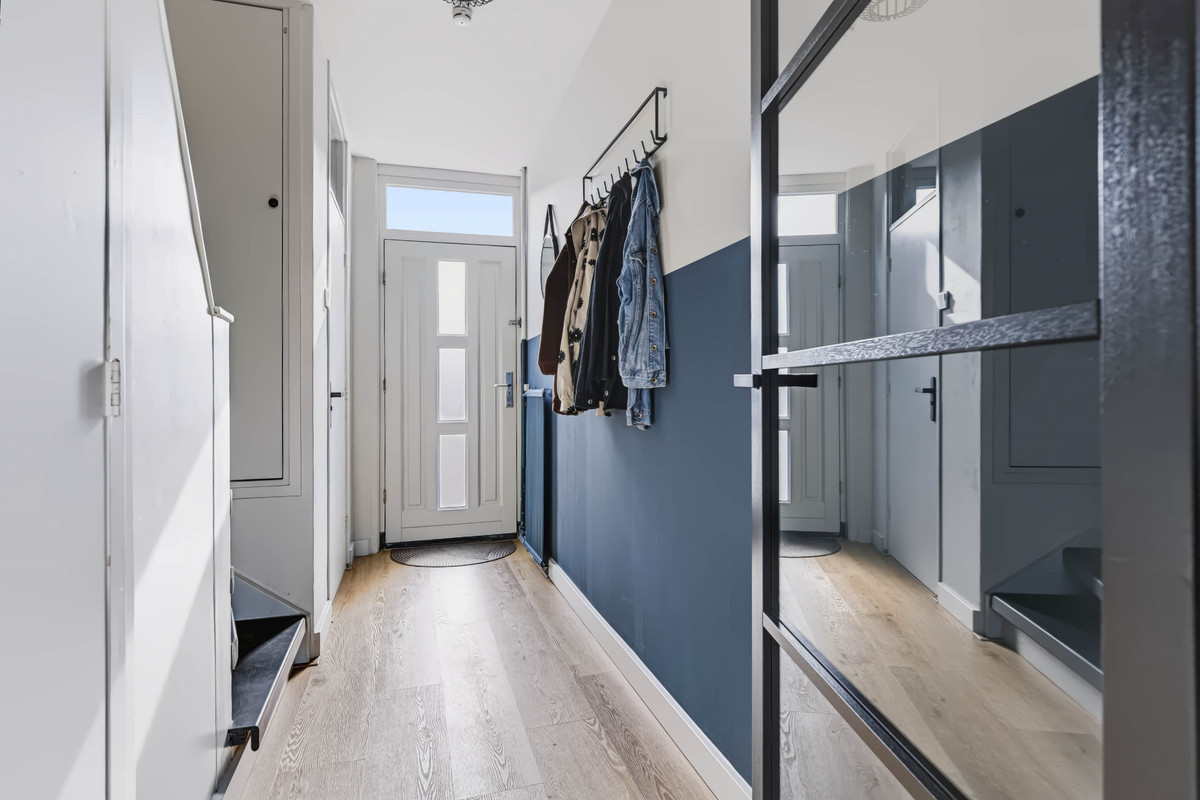 Tussenwoning te koop: Merelstraat 10, Vaassen