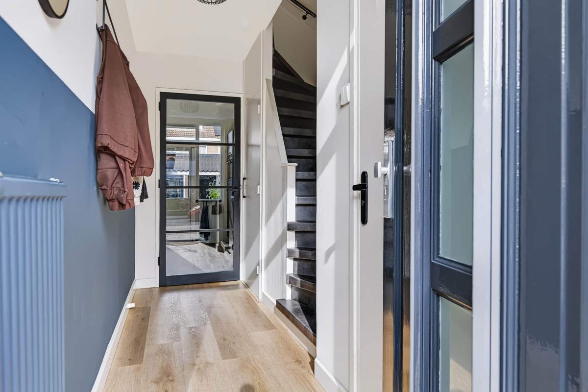 Tussenwoning te koop: Merelstraat 10, Vaassen