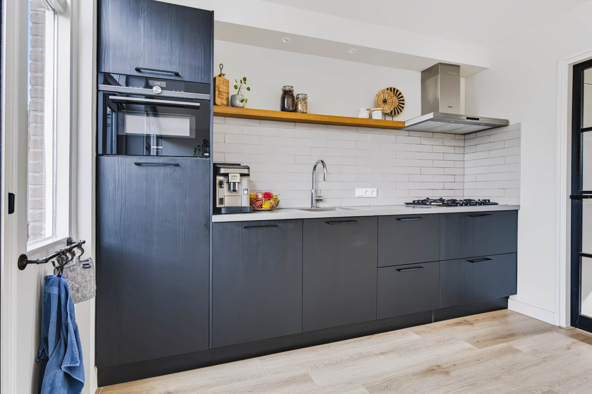 Tussenwoning te koop: Merelstraat 10, Vaassen
