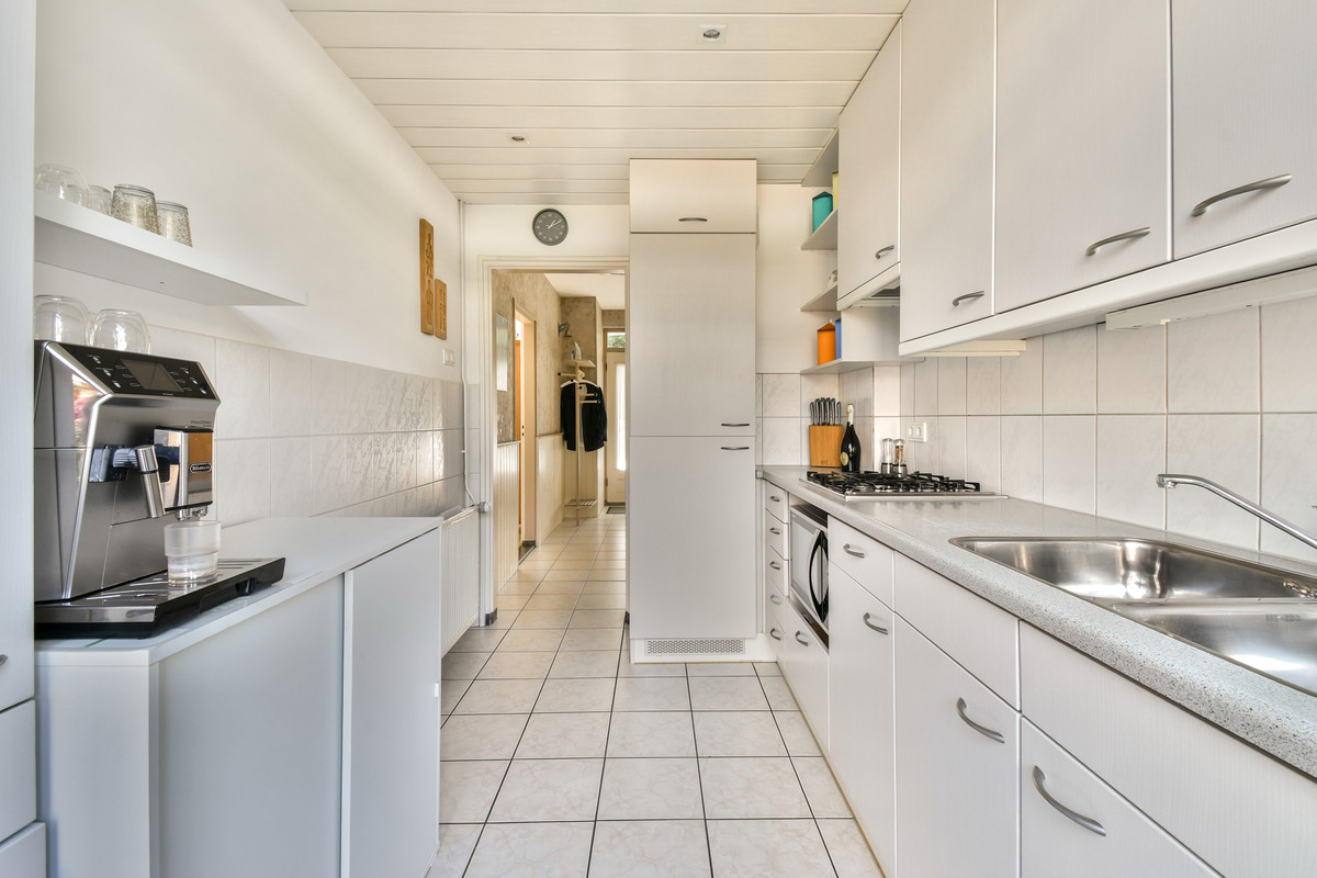 Tussenwoning te koop: Clematislaan 57, Oegstgeest
