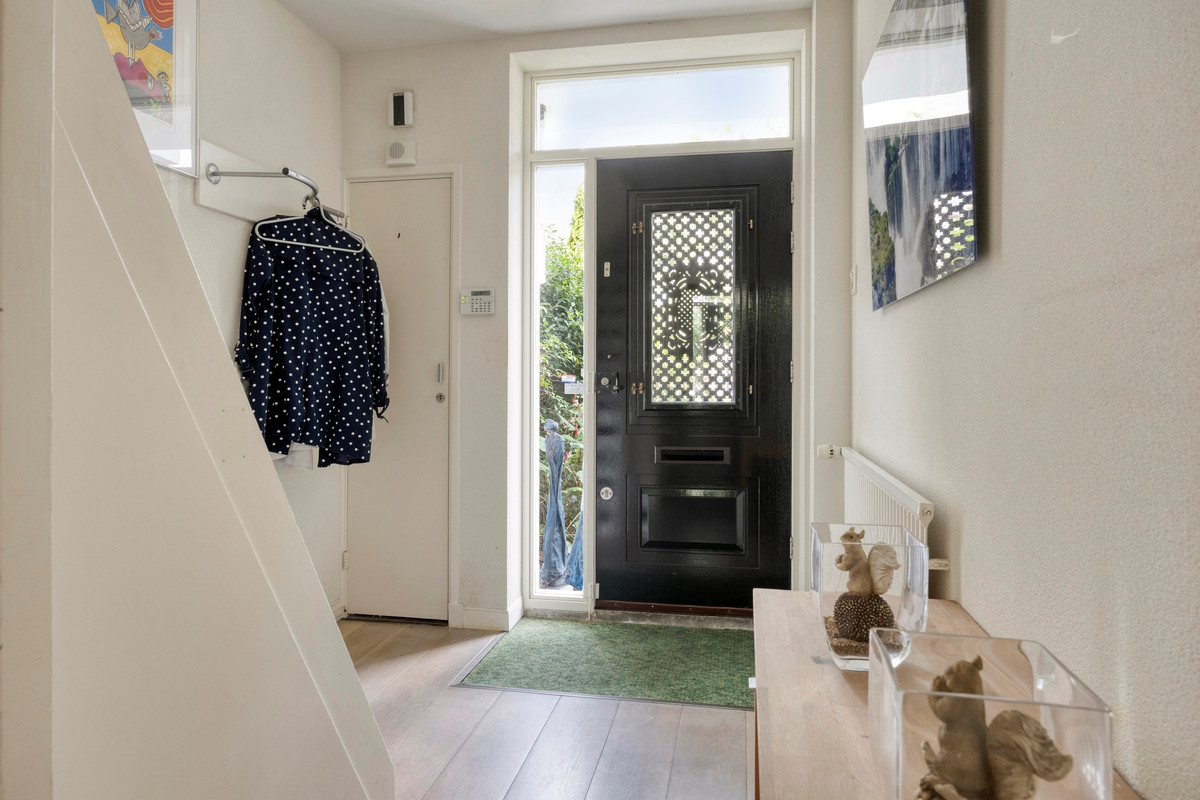 Tussenwoning te koop: Rozenlaan 4, Oegstgeest