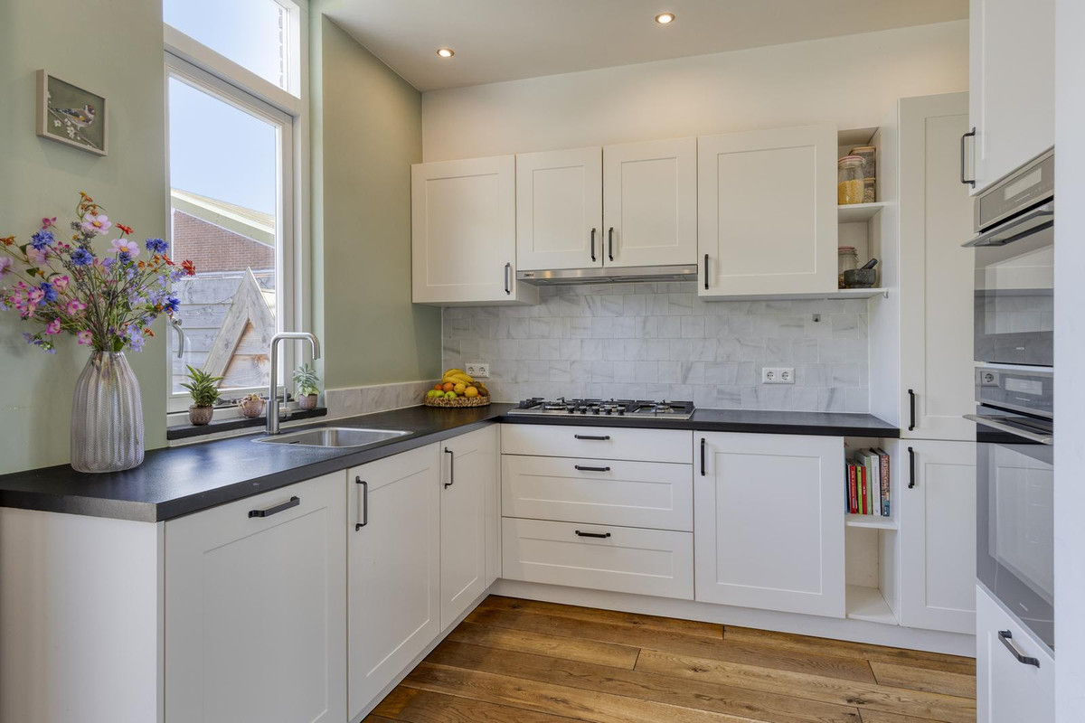 Tussenwoning te koop: Noordeinde 73, Waddinxveen