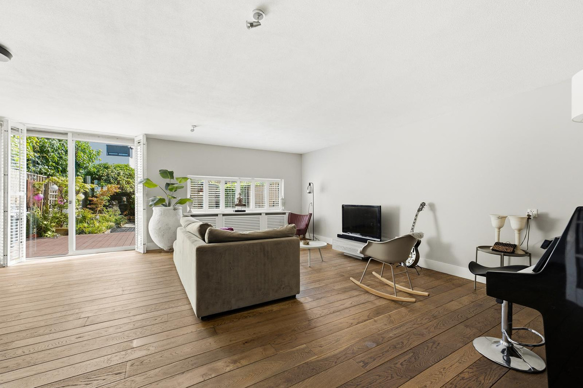 Tussenwoning te koop: W. Plokkerstraat 36, Spijkenisse