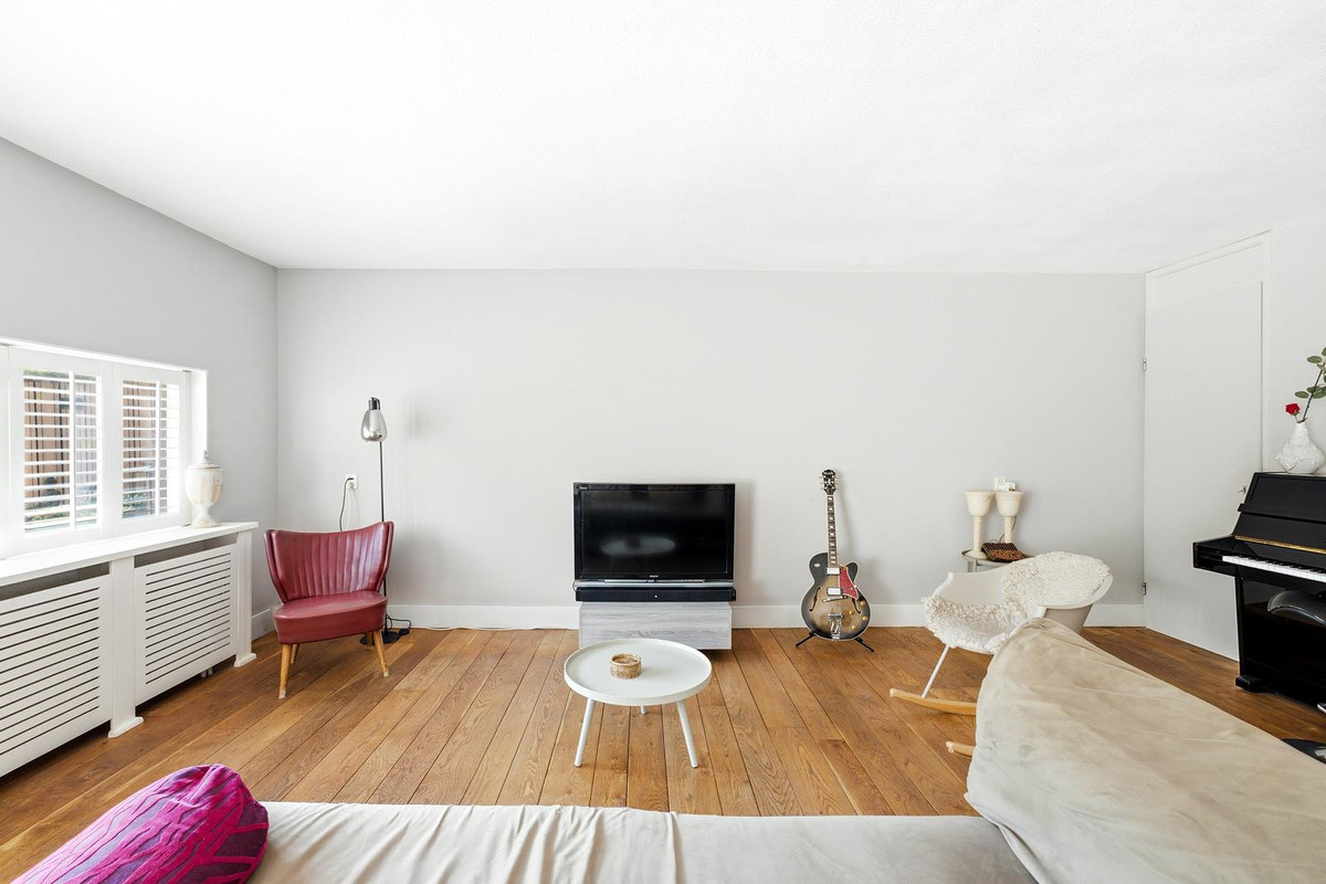 Tussenwoning te koop: W. Plokkerstraat 36, Spijkenisse
