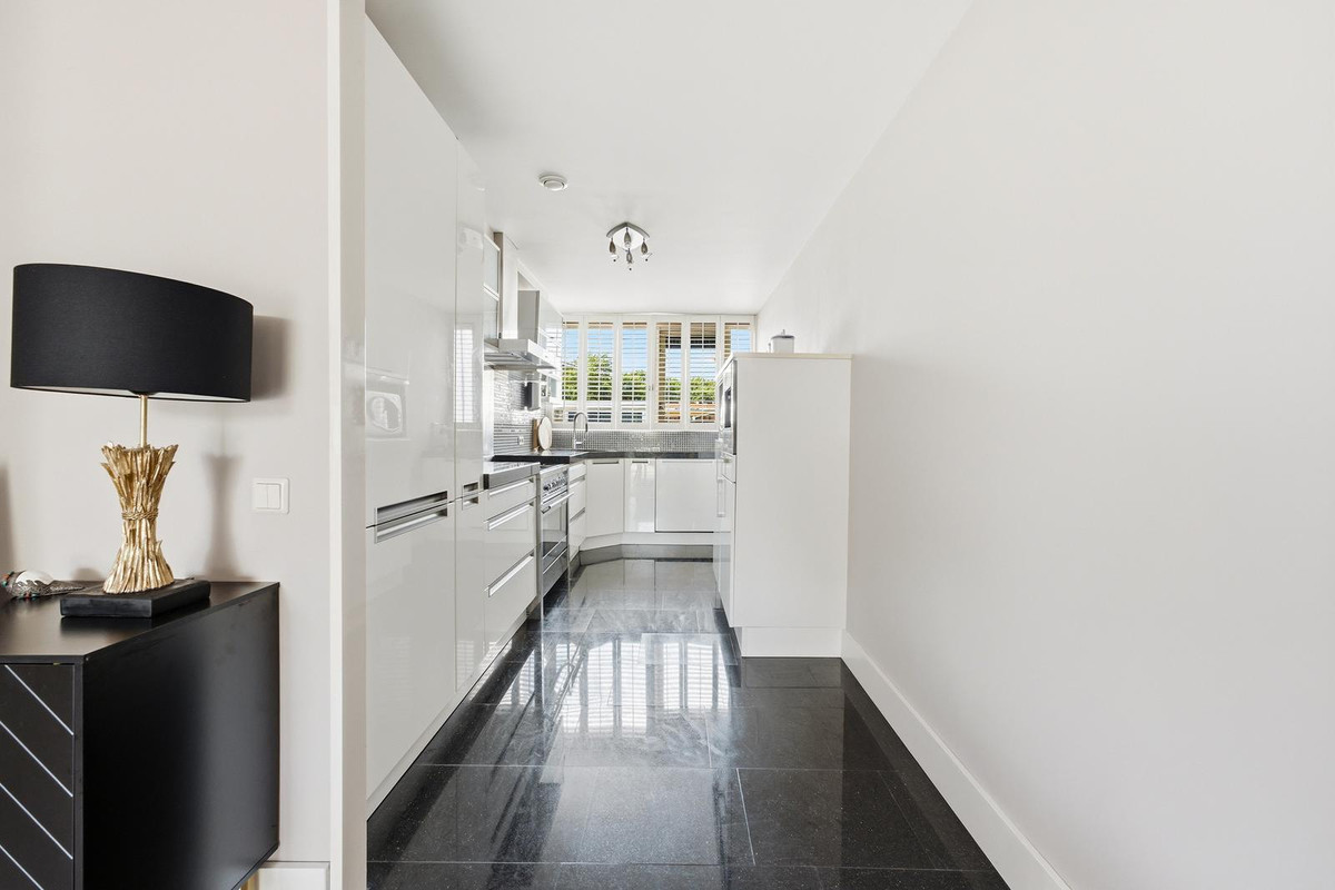 Tussenwoning te koop: W. Plokkerstraat 36, Spijkenisse