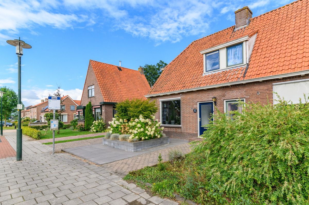Twee-onder-één-kap te koop: Hoofdstraat 57, Ossenzijl