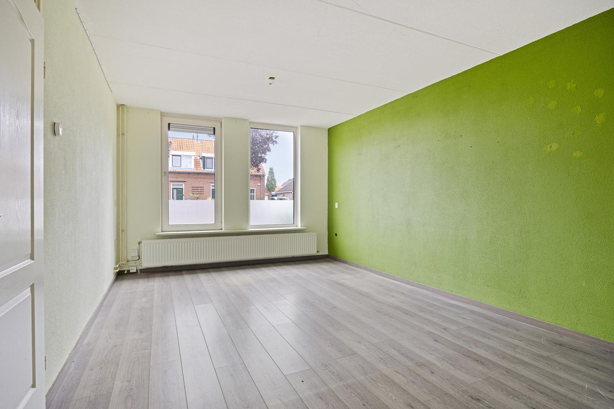 Tussenwoning te koop: Harm van der Laanweg 10, Nieuwe Pekela