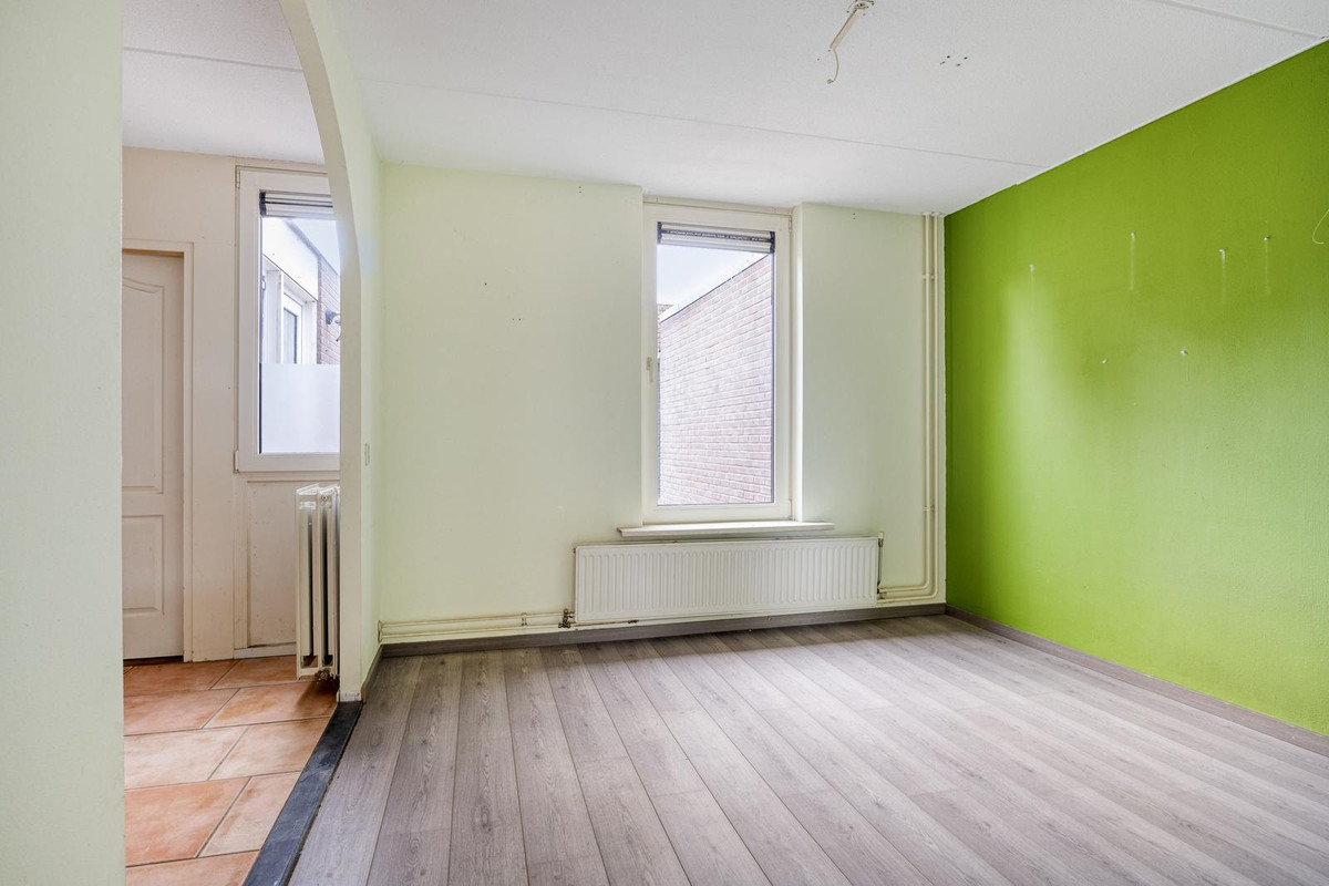Tussenwoning te koop: Harm van der Laanweg 10, Nieuwe Pekela