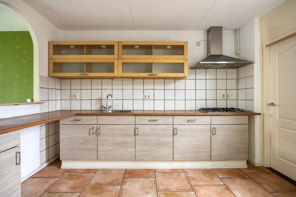 Tussenwoning te koop: Harm van der Laanweg 10, Nieuwe Pekela