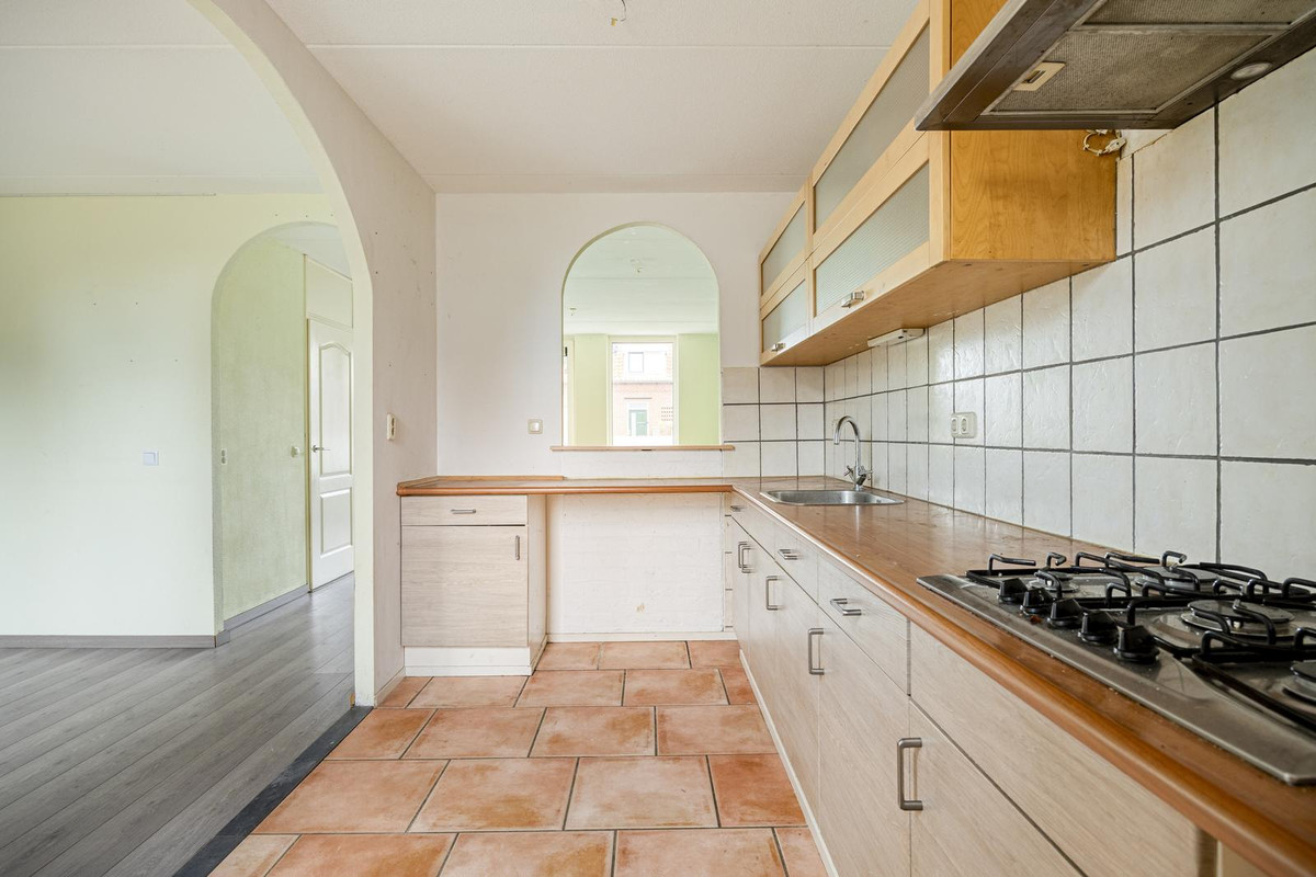 Tussenwoning te koop: Harm van der Laanweg 10, Nieuwe Pekela