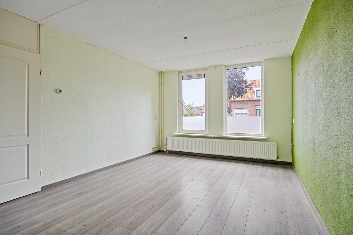 Tussenwoning te koop: Harm van der Laanweg 10, Nieuwe Pekela