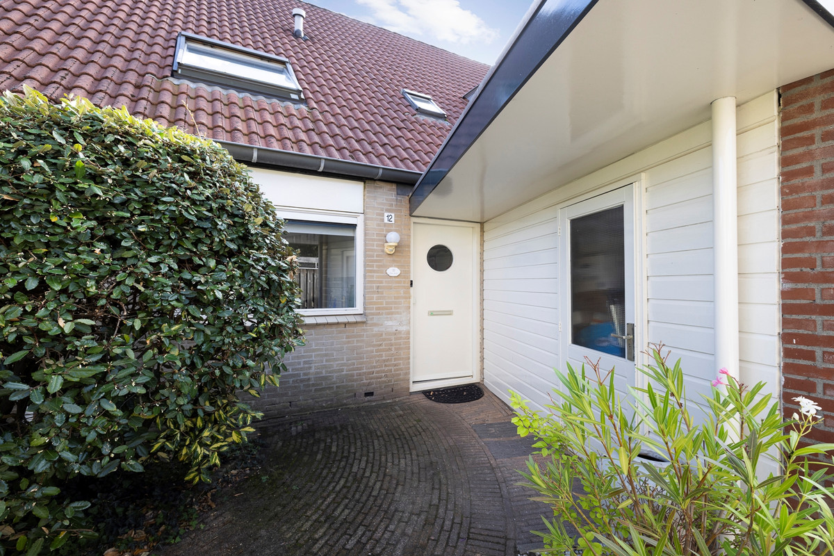 Tussenwoning te koop: Johanna van Heukelomstraat 12, Haarlem