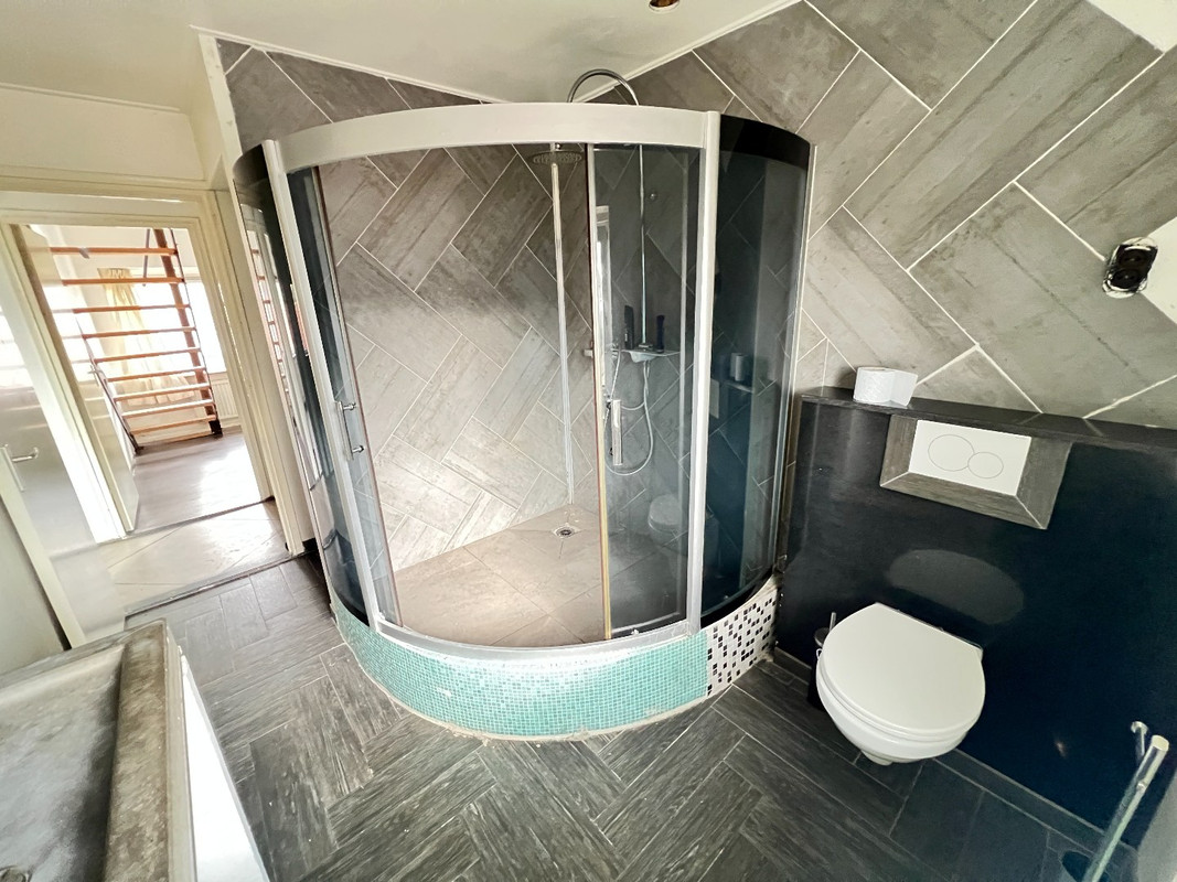 Tussenwoning te koop: Rozenstraat 21, Asten