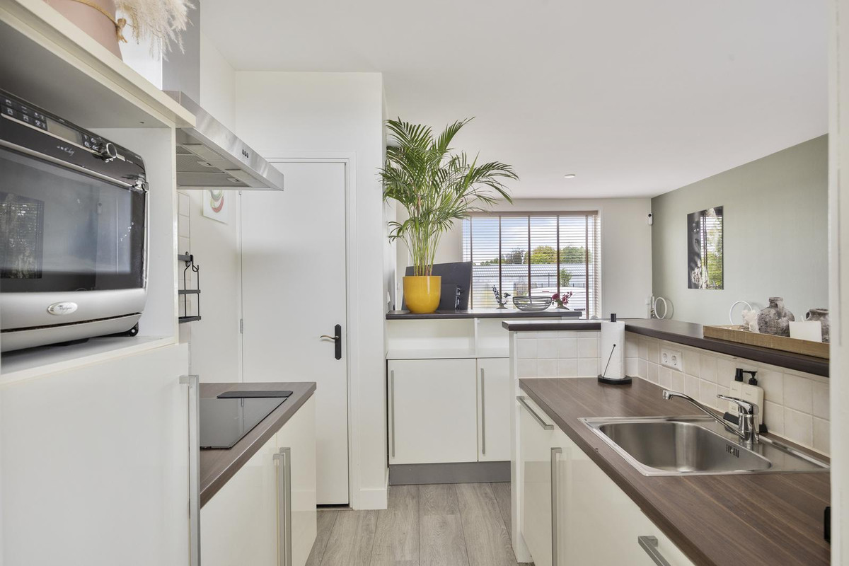 Tussenwoning te koop: Tuinstraat 107, Boskoop