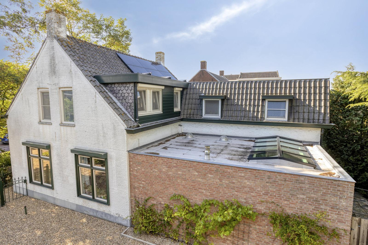 Vrijstaande woning te koop: Dorpsstraat 83, Halsteren
