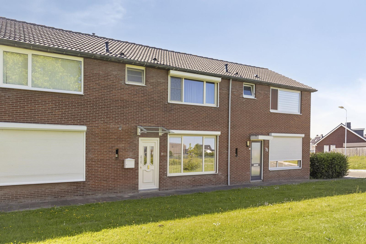 Tussenwoning te koop: Buitenweg 72, Axel