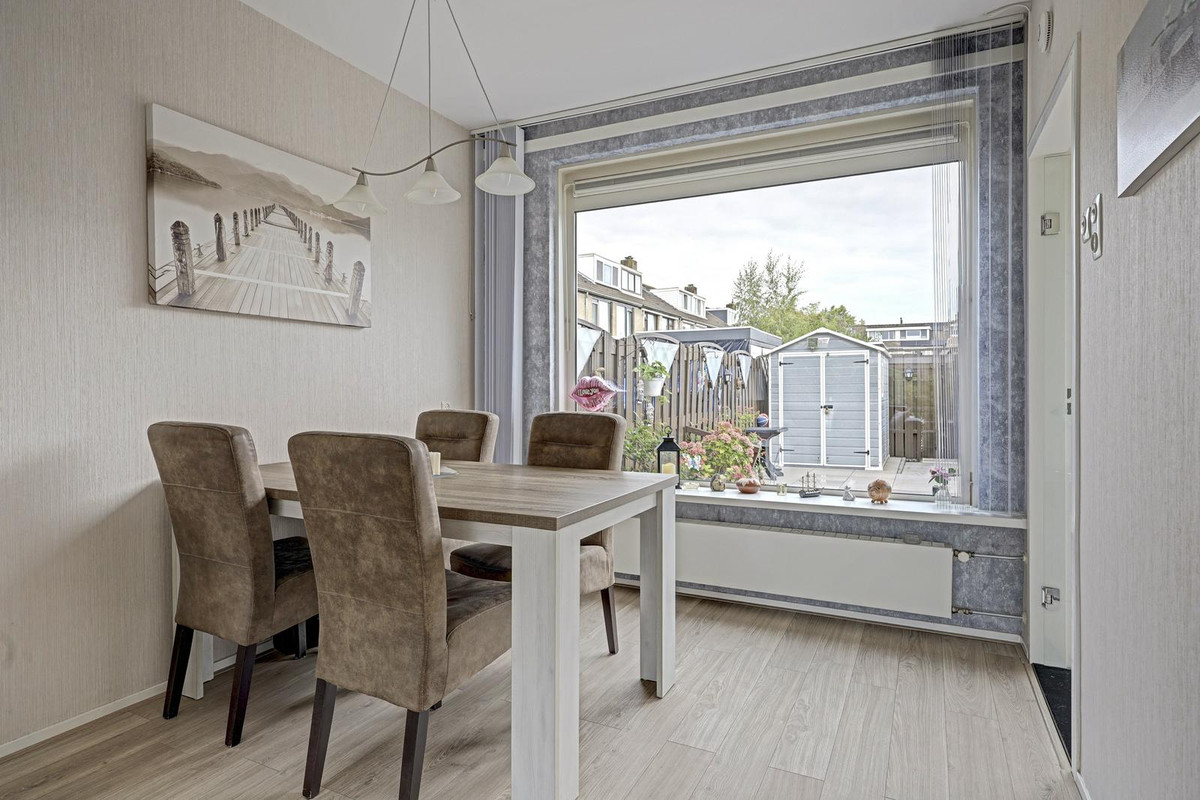 Tussenwoning te koop: Deimospad 9, Spijkenisse