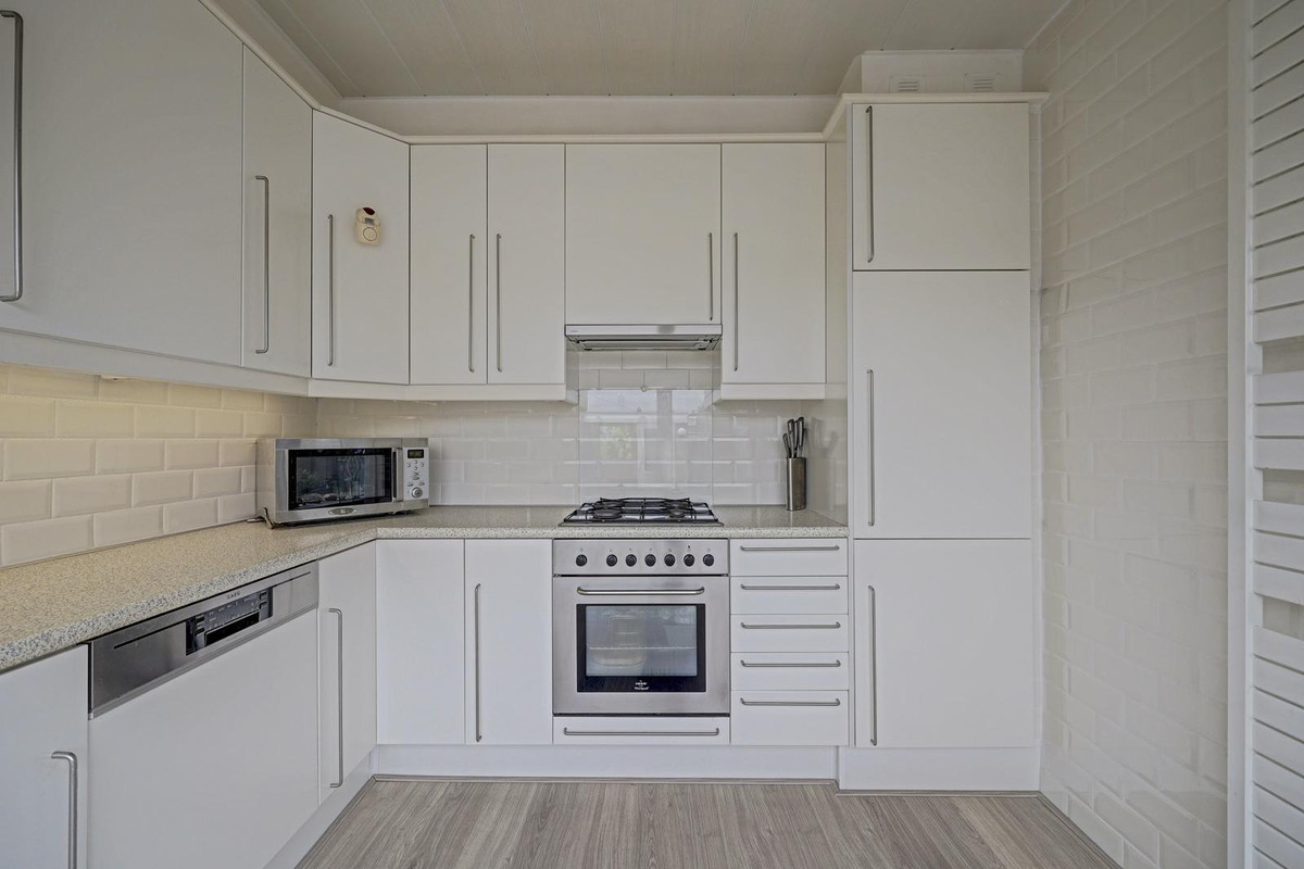Tussenwoning te koop: Deimospad 9, Spijkenisse