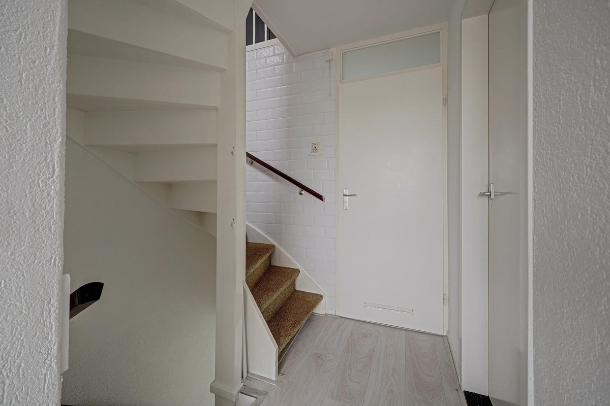 Tussenwoning te koop: Deimospad 9, Spijkenisse