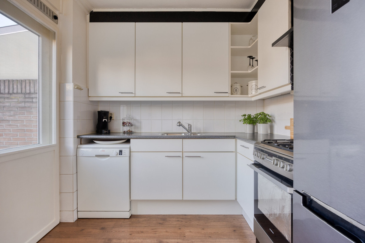 Tussenwoning te koop: Glasblazererf 12, Roermond