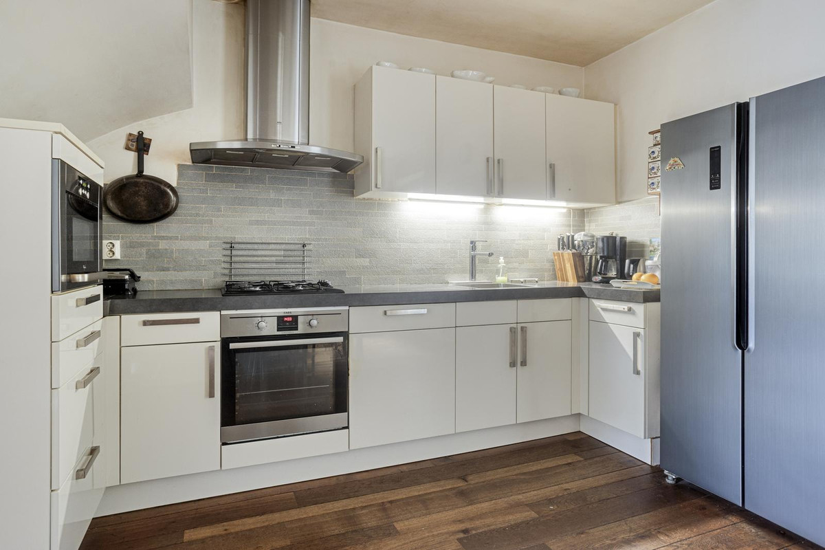 Tussenwoning te koop: Amerongenstraat 33BIS, Breda