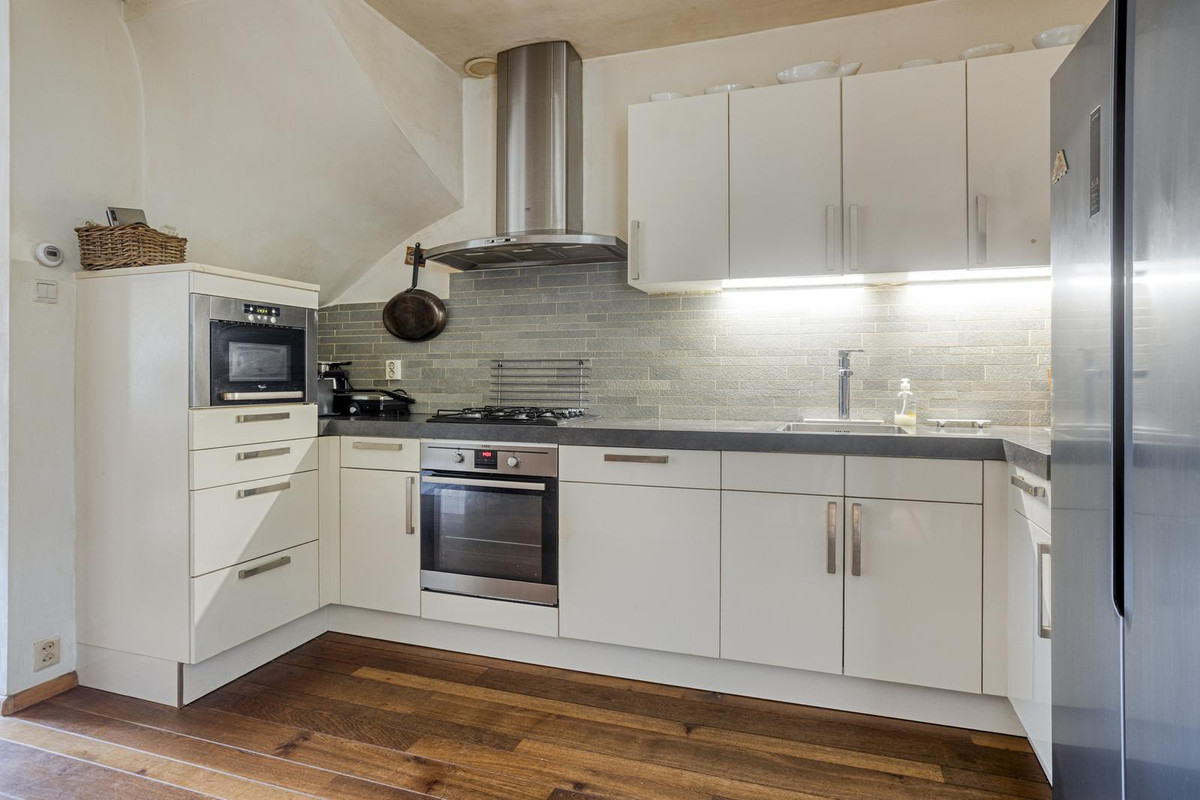 Tussenwoning te koop: Amerongenstraat 33BIS, Breda