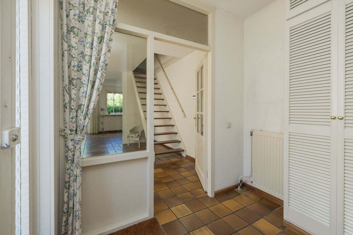 Tussenwoning te koop: Meidoornplantsoen 32, Lisse