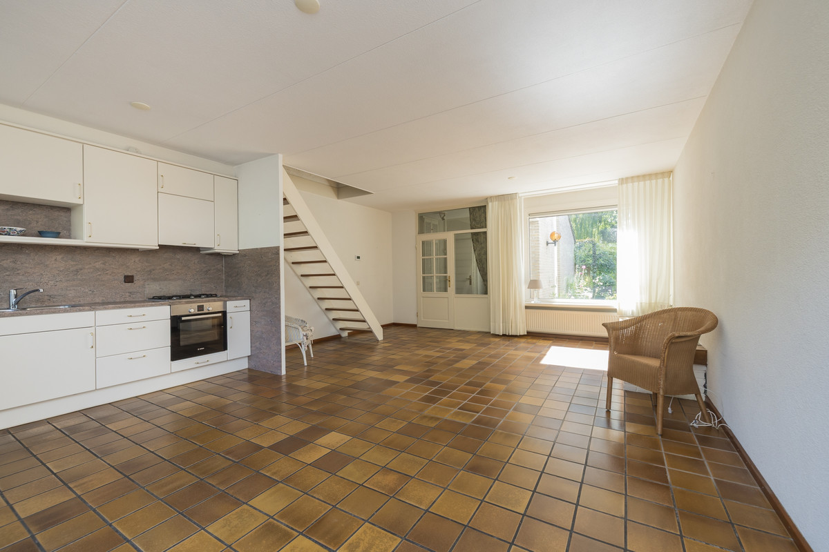 Tussenwoning te koop: Meidoornplantsoen 32, Lisse