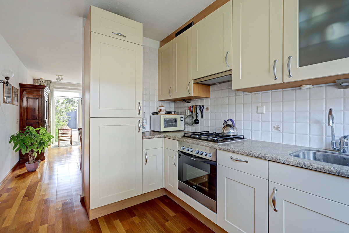 Tussenwoning te koop: Latonalaan 45, Apeldoorn