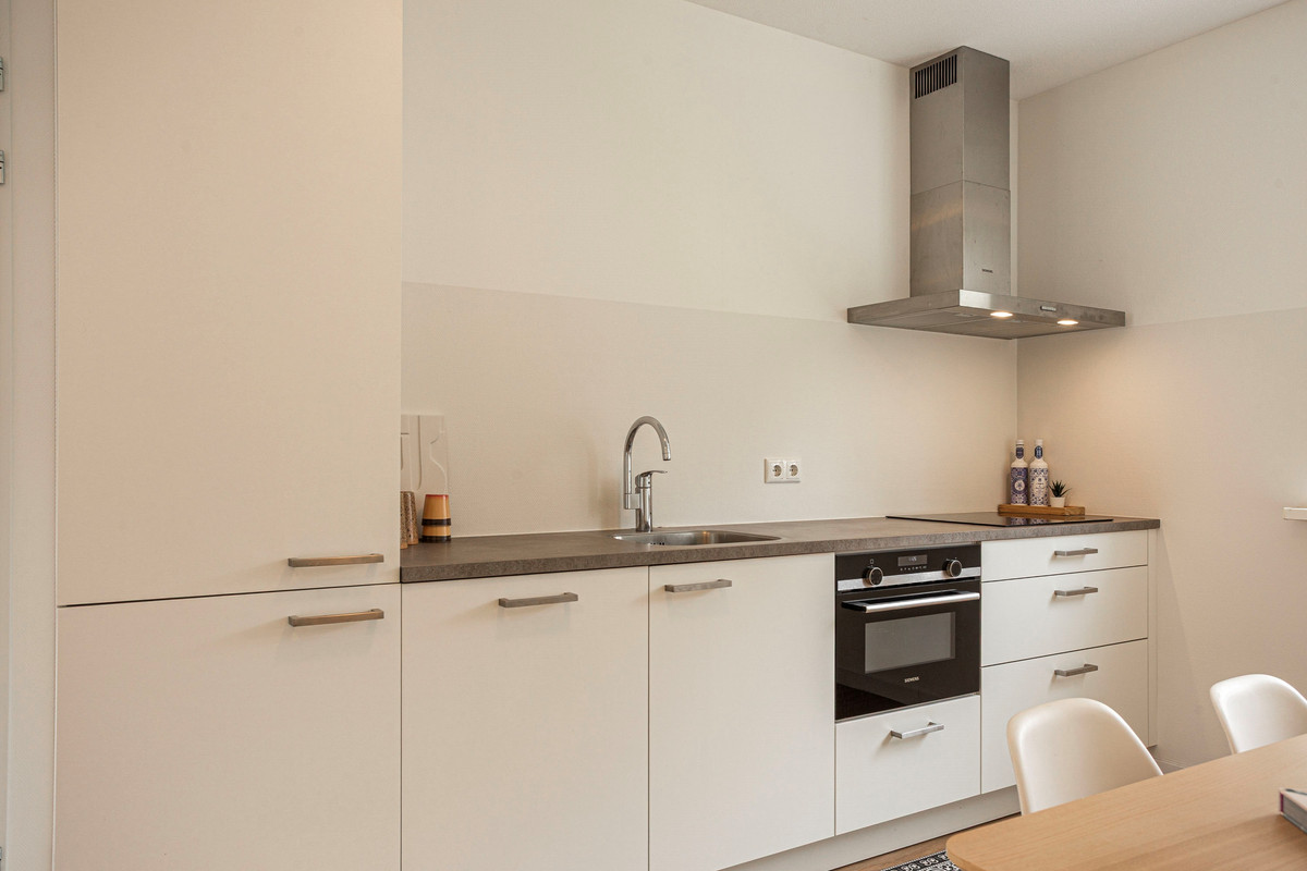Tussenwoning te koop: M.C. Escherstraat 40, Hengelo