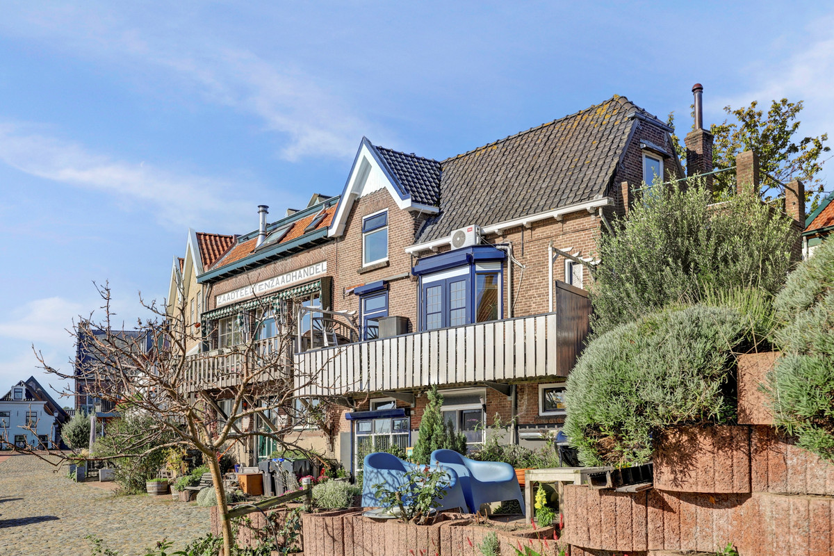 Hoekwoning te koop: Slikdijk 16, Ooltgensplaat
