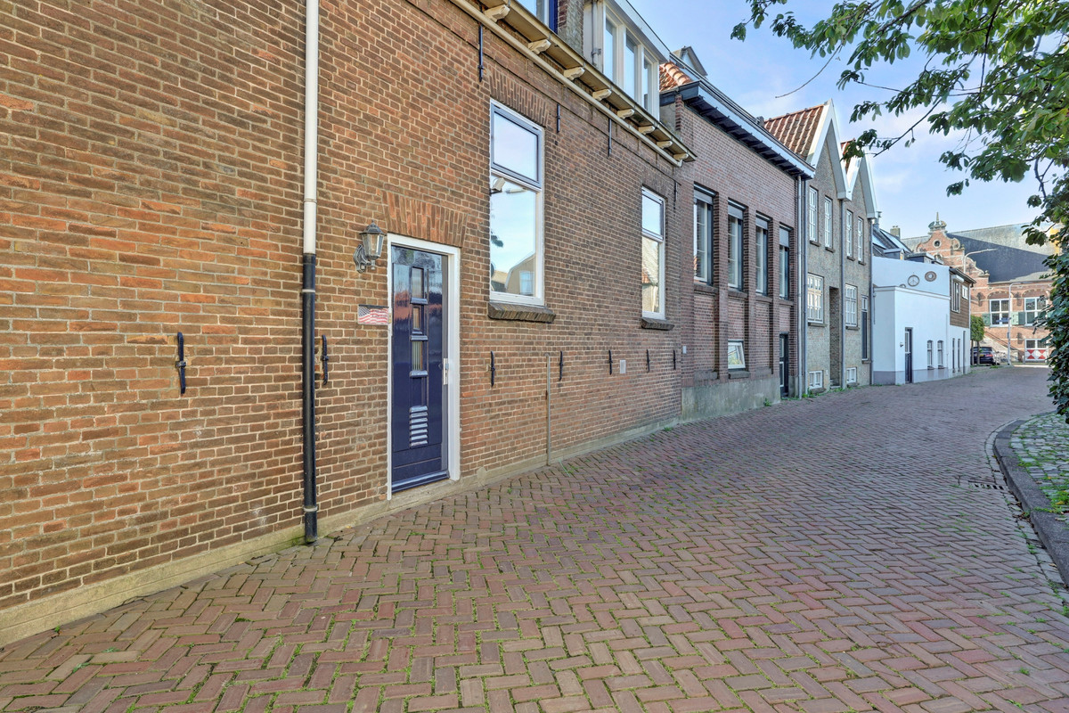 Hoekwoning te koop: Slikdijk 16, Ooltgensplaat