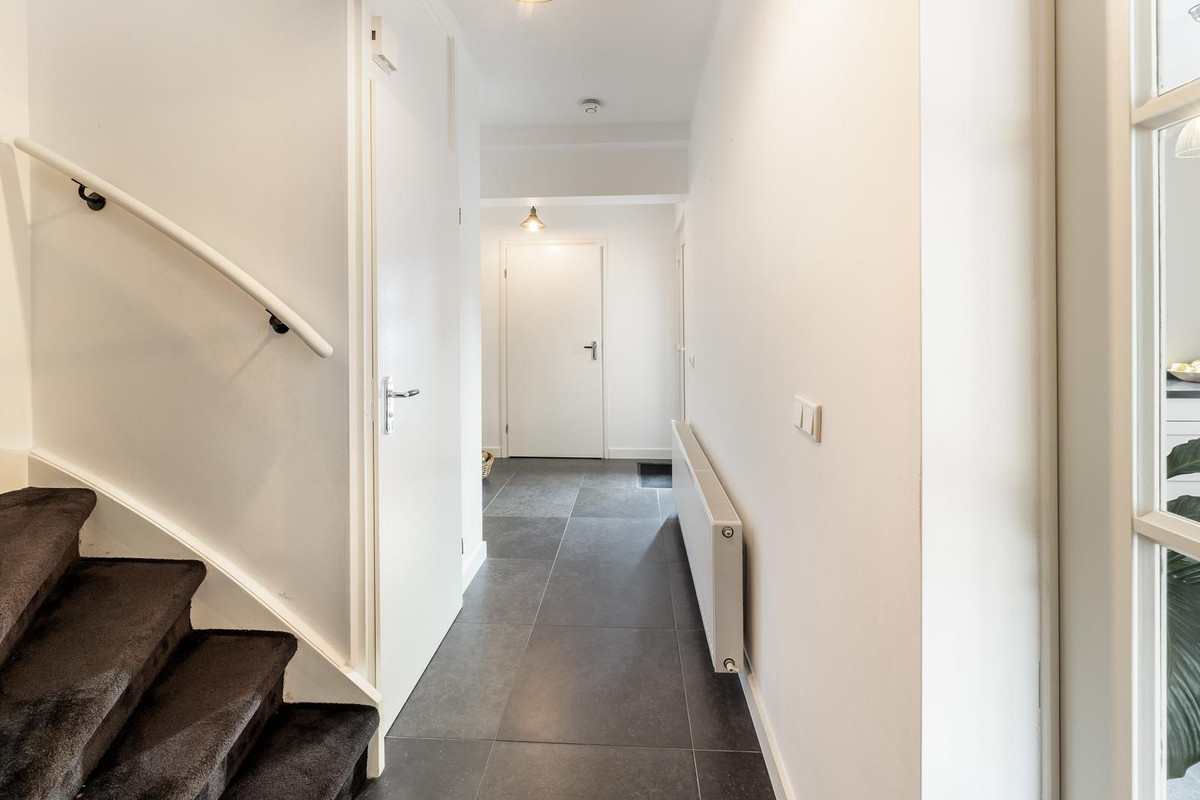Tussenwoning te koop: Kolmschotlanden 45, Enschede